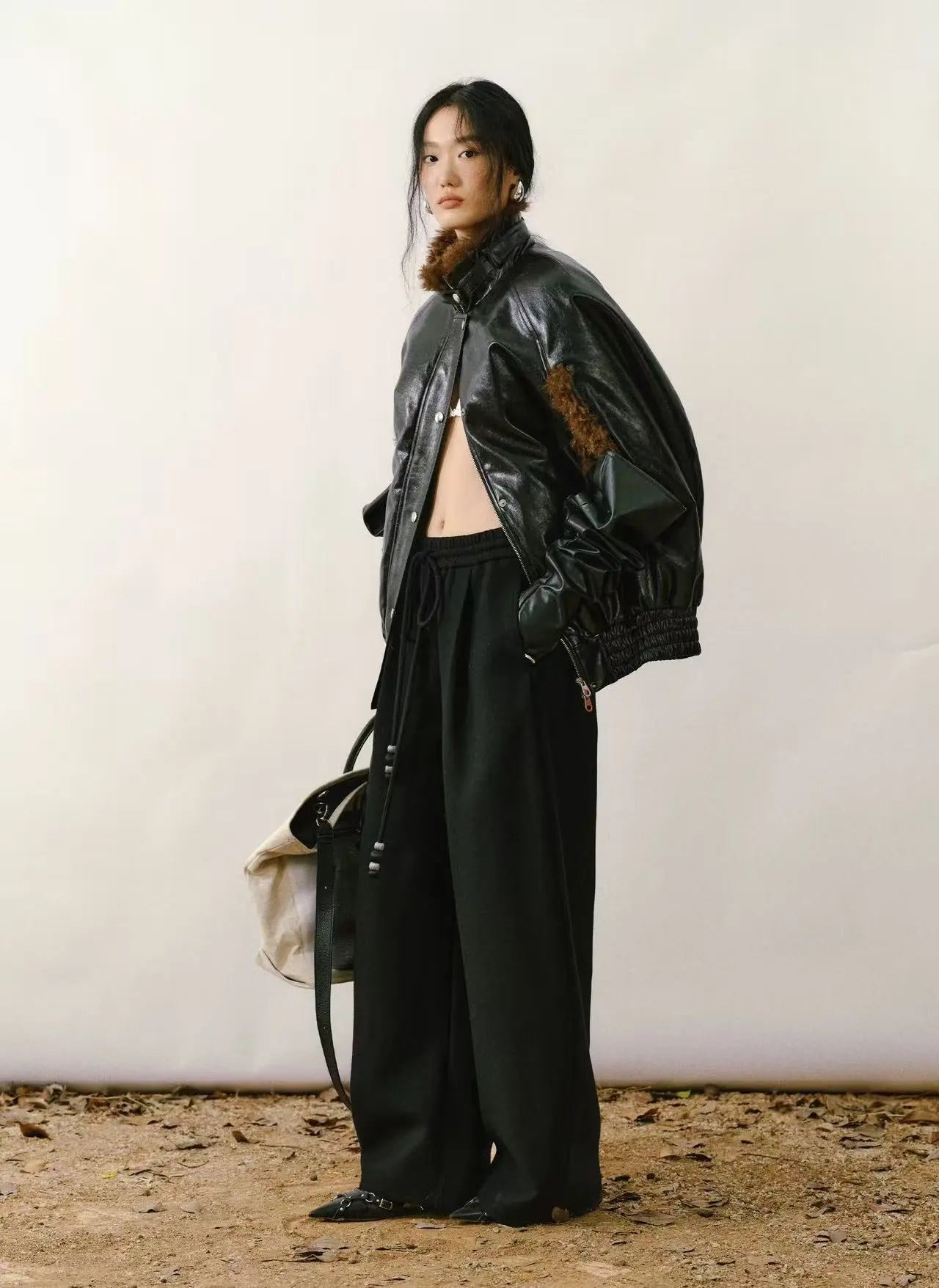 High-Neck Sleeveless PU Cape Jacket - Velanocta