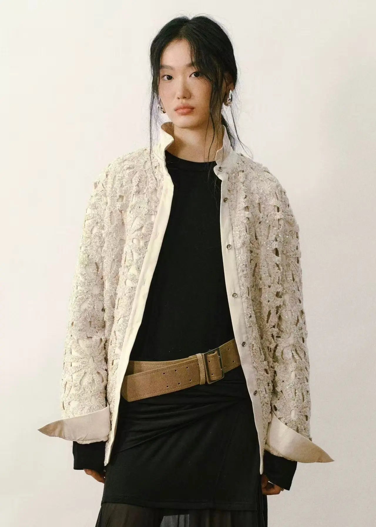 Flat lay of a colorful 90s vintage shirt with a geometric abstract pattern and button-down collar - Velanocta